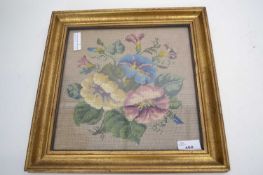 Framed embroidery of flowers