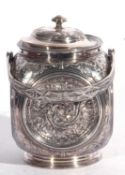 Antique EPBM biscuit barrel of square form, each side having an impressed circular floral panel,