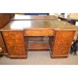 Victorian walnut veneered twin pedestal office desk with dark green inset writing surface, 138 cm