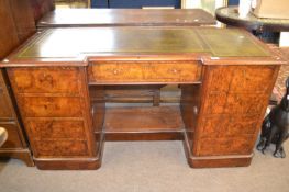 Victorian walnut veneered twin pedestal office desk with dark green inset writing surface, 138 cm