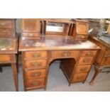 Late Victorian oak twin pedestal office desk, the top with tooled leather writing surface and