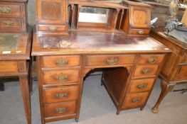 Late Victorian oak twin pedestal office desk, the top with tooled leather writing surface and