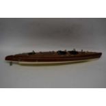 20th Century hardwood model boat with fitted interior together with a small booklet from Authentic