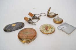 Quantity of compacts and watches