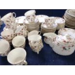 Extensive quantity of Minton tea wares in the ancestral pattern including cups, saucers, teapot,