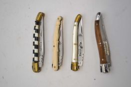 Bag containing four penknives by Laguiole