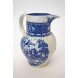 Late 18th Century pearl ware cabbage moulded jug with blue and white designs, 20cm high