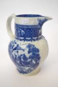 Late 18th Century pearl ware cabbage moulded jug with blue and white designs, 20cm high