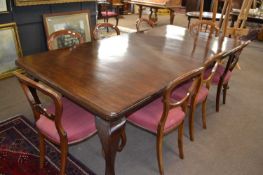 Set of eight Victorian mahogany balloon back dining chairs together with a late 19th or early 20th