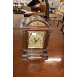 Late Victorian mahogany cased small bracket clock by J W Benson, London (presentation plaque dated
