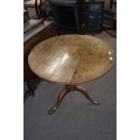 Georgian oak supper table with circular top raised on a turned column with tripod base, 84 cm