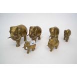 Graduated set of six brass elephants, tallest 14cm high