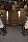 Early 20th Century oval oak extending dining table on barley twist legs