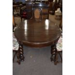 Early 20th Century oval oak extending dining table on barley twist legs