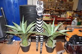 TWO POT PLANTS AND A ZEBRA