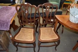 PAIR OF CANE SEATED DINING CHAIRS