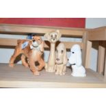 FOUR VARIOUS DOG FIGURES