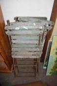 FIVE VINTAGE WOOD AND METAL FOLDING CHAIRS