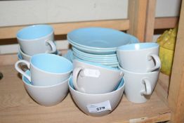 SELECTION OF POOLE CUPS AND SAUCERS