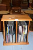SMALL CD RACK AND CONTENTS