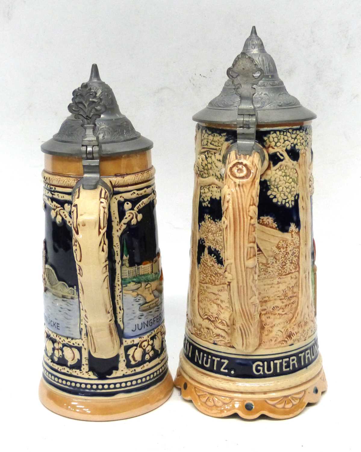 Pair of German Pottery Mettlach style steins, one entitled 'Elbbrucke', the other a musical jug - Image 6 of 8