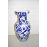 CHINESE VASE DECORATED WITH PRUNUS, BLOSSOM AND BRANCHES ON A BLUE GROUND