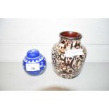 SMALL ORIENTAL JAR AND COVER WITH PRUNUS ON A BLUE GROUND AND A FURTHER SYLVAC VASE