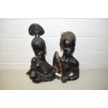 PAIR OF WALL SCULPTURES OF AN AFRICAN LADY AND MAN