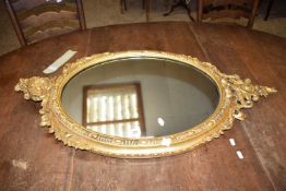 VINTAGE GILT PAINTED GESSO FRAMED OVAL MIRROR, WIDTH APPROX 56 CM