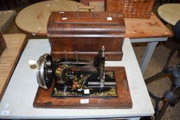 CASED HAND CRANKED SEWING MACHINE