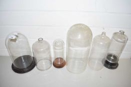 QUANTITY OF GLASS JARS AND GLASS DOMES