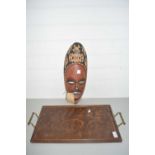 A CARVED WOODEN AFRICAN MASK TOGETHER WITH A WOODEN TRAY