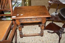 SMALL JOINTED TABLE WITH CARVED DECORATION