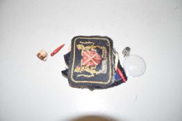 PLASTIC BAG CONTAINING QUANTITY OF EMBROIDERY BADGES