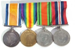WWI/II British medal group of 4, to include 1914-18 war medal, 1914-19 victory medal, defence