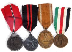 Quantity of 4 medals, to include Third Reich 'Winterschlacht In Osten' 41/42 Ostmedaille in original