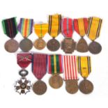 A quantity of 11 WWI/II Belgian medals to include 3 x 1940-45 war medals (one with crossed