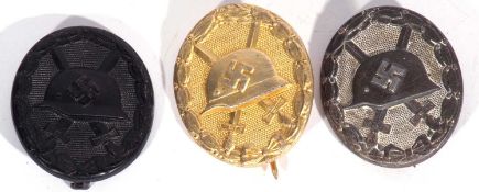 Third Reich Black Naval badge, lacking pin, together with silver naval badge and gold naval badge