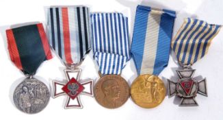 Quantity of 5 x medals to include Polish Polski Zwiazek Lowiecki medal for sacrifice and courage,