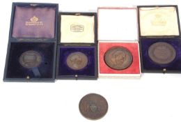 A Carton to include five bronze medallions comprising national rifle association 1860, 48mm,