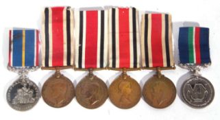 Four various Special Constabulary Faithful Service Medals together with National Service and