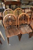 SET OF FOUR ERCOL STICK BACK CHAIRS