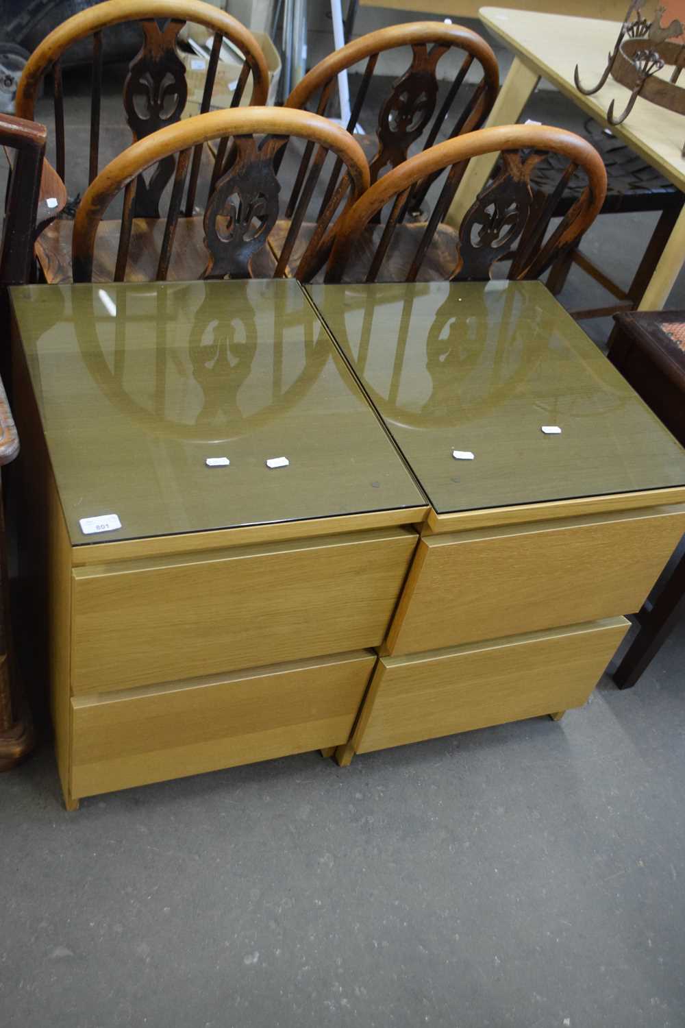 PAIR OF GLASS TOPPED BEDSIDE CABINETS