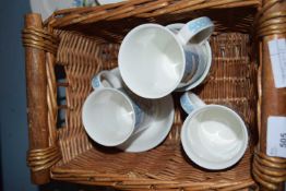 BASKET CONTAINING SNOWMAN MUGS AND BOWLS