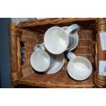 BASKET CONTAINING SNOWMAN MUGS AND BOWLS