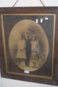 OVAL BLACK AND WHITE PHOTOGRAPH, FAMILY GROUP, FRAMED AND GLAZED