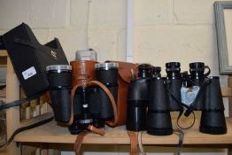 THREE PAIRS OF VINTAGE BINOCULARS