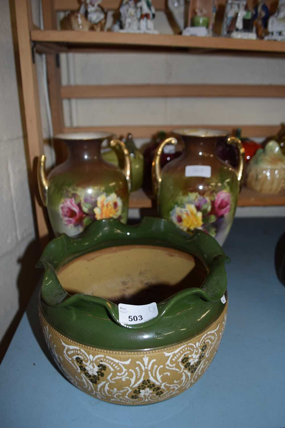 STONEWARE JARDINIERE WITH GREEN FRILLED RIM TOGETHER WITH A PAIR OF FLORAL DECORATED VASES