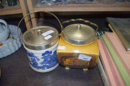 TWO BISCUIT BARRELS WITH SILVER PLATED MOUNTS