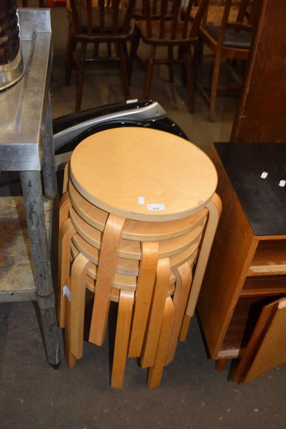 SIX STACKING WOODEN STOOLS